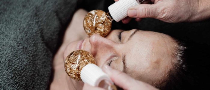 Client receiving a professional facial treatment at Ashlyns Medispa in Essex to improve skin health and restore a radiant complexion.